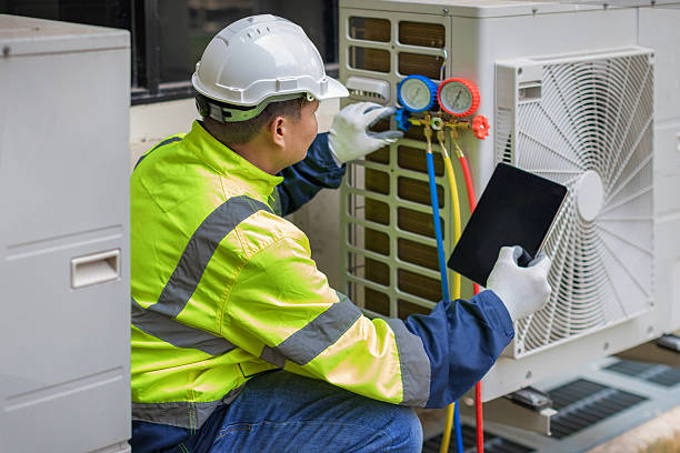 Professional Hvac technician working in Mims, FL